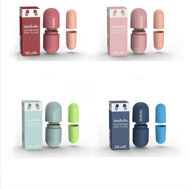 A pair of white silicone ear plugs designed for noise reduction, displayed in a compact storage box.