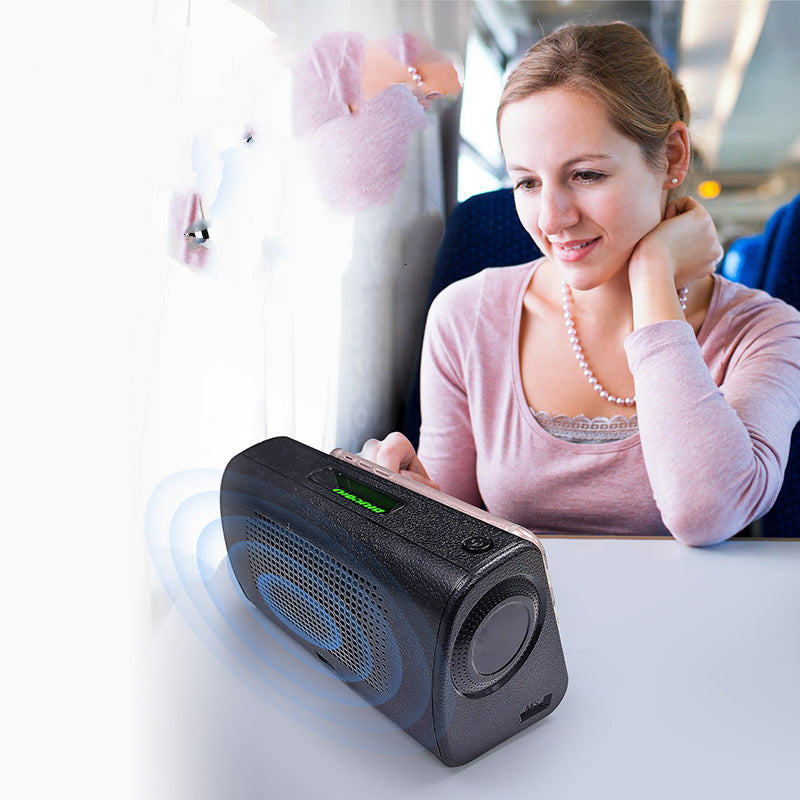 Magnetic Induction Wireless Smart Subwoofer Speaker in black, showcasing its sleek design and portable features.