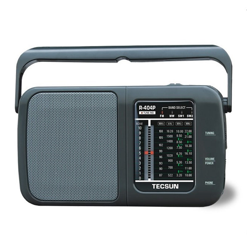 Portable AC and DC radio with built-in speaker, compact design, and power cord.