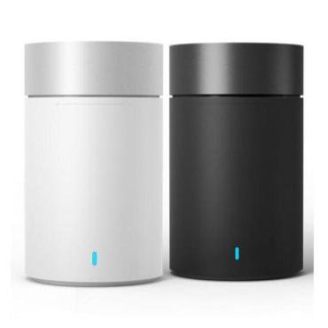 Portable Wireless Mini Stereo Car Bluetooth Speaker in a sleek design, showcasing its compact size and modern aesthetic, perfect for on-the-go music lovers.