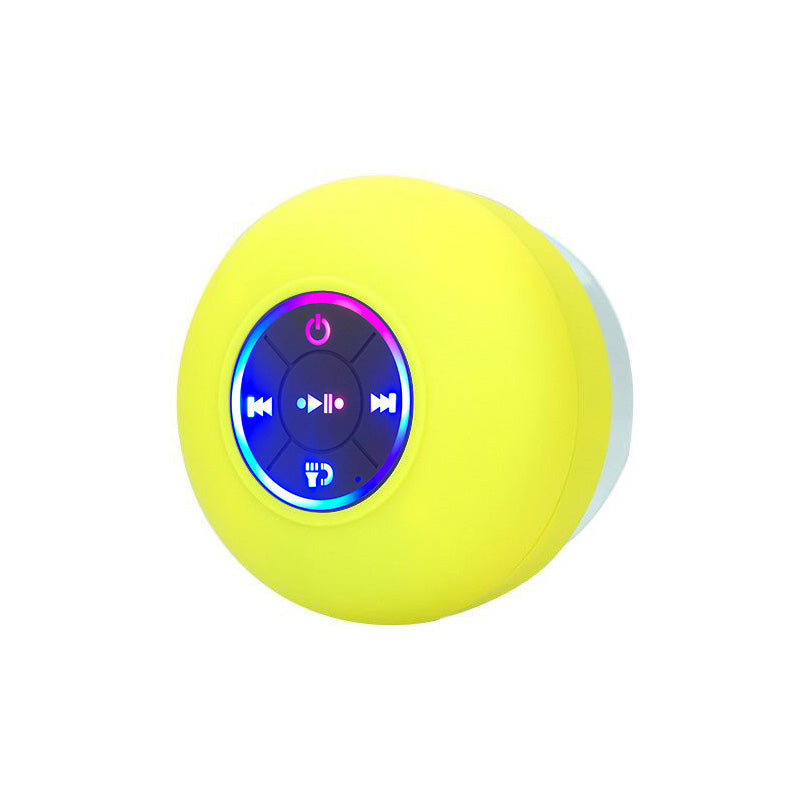A waterproof Bluetooth speaker with LED lights, showcasing its sleek design and portable features, perfect for outdoor use.
