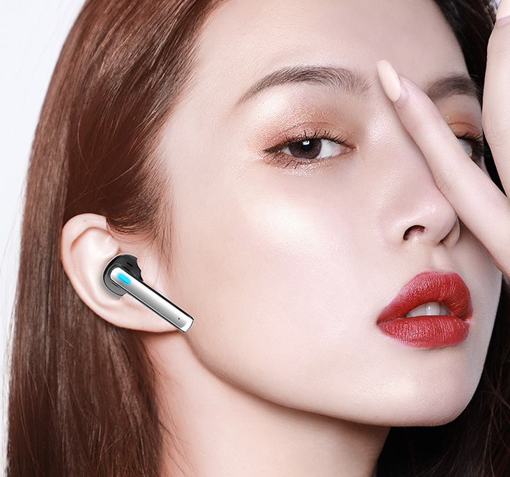 Wireless Bluetooth Headset 5.0 in-ear headphones with charging bay and data cable, showcasing sleek design and advanced features.