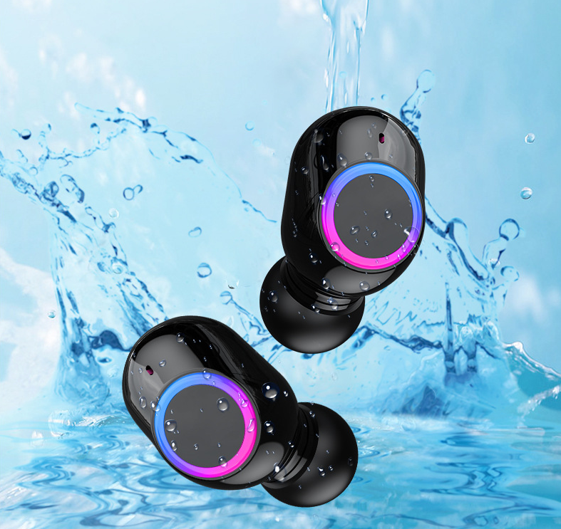 Wireless Bluetooth Headset with a sleek metal shell design, showcasing its earplugs and charging cable.