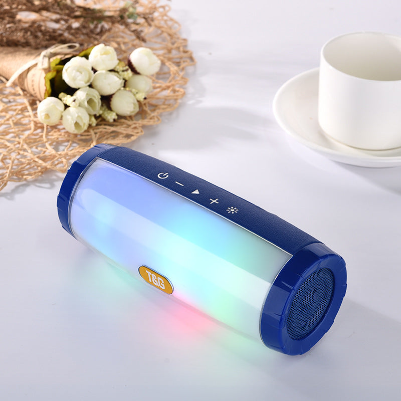 Wireless Bluetooth Speaker in various colors with LED lights, showcasing its portable design and features.