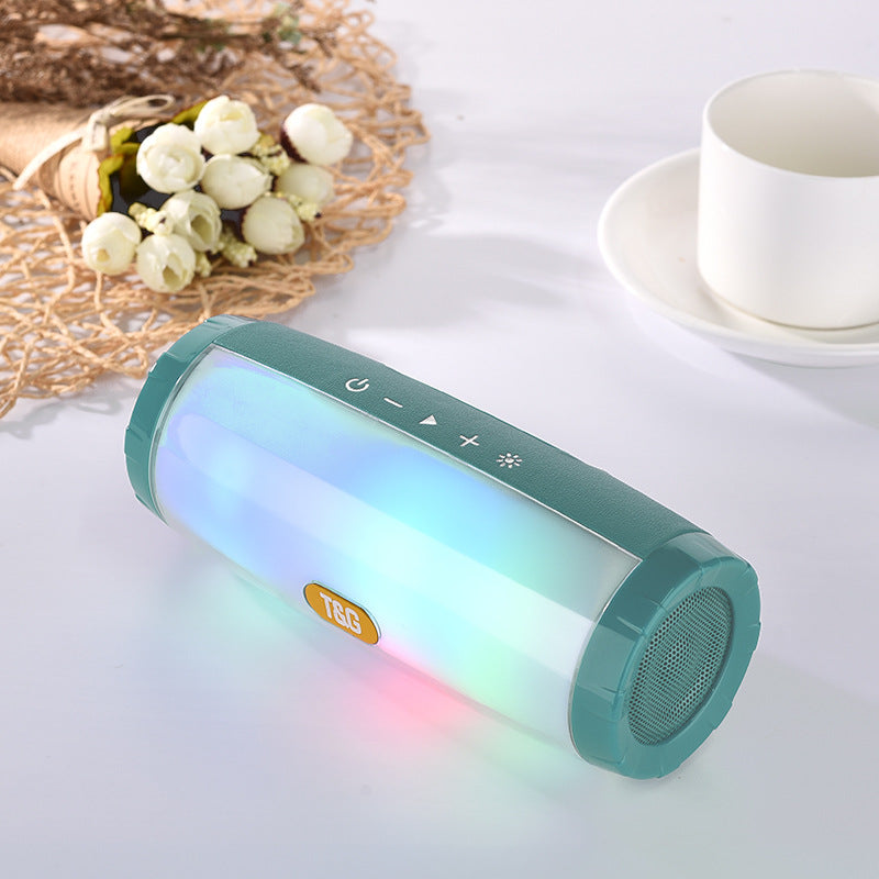 Wireless Bluetooth Speaker in various colors with LED lights, showcasing its portable design and features.