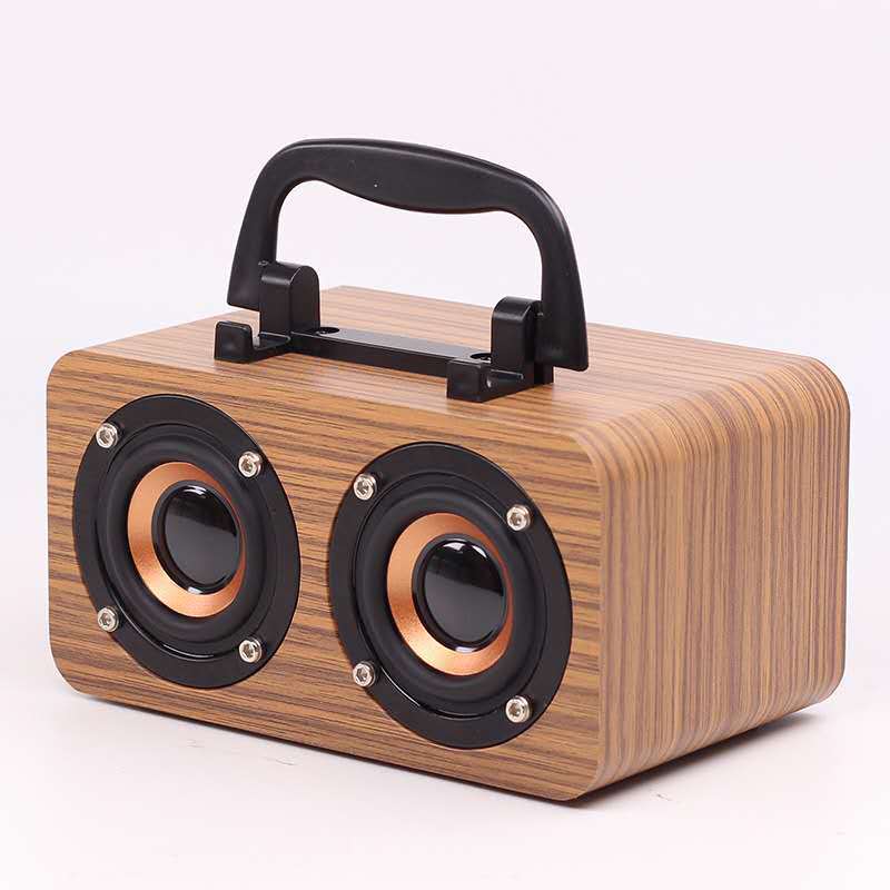 Wooden Wireless Bluetooth Speaker designed for outdoor use, featuring a stylish wooden shell and compact design.