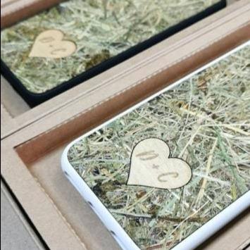 Personalized Alpine Hay phone case featuring a custom engraved wooden heart with unique text.