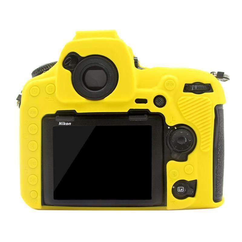 AMZER Soft Silicone Protective Case for Nikon D850 in yellow, showcasing its snug fit and precise cutouts for camera functions.