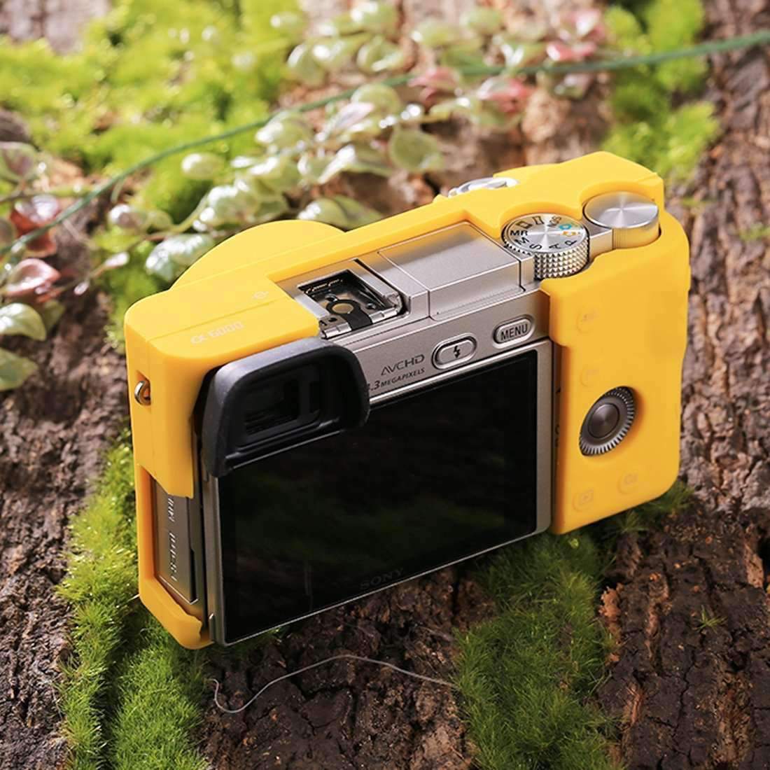 AMZER Soft Silicone Protective Case for Sony ILCE-6000 in yellow, showcasing its durable and lightweight design.