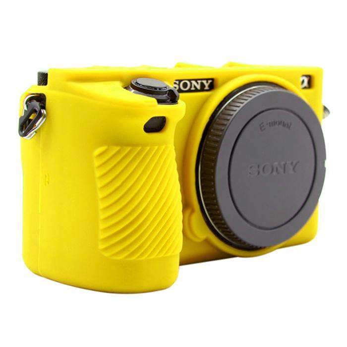 AMZER Soft Silicone Protective Case for Sony ILCE-6500 in yellow, showcasing its soft texture and precise cutouts for camera functionality.
