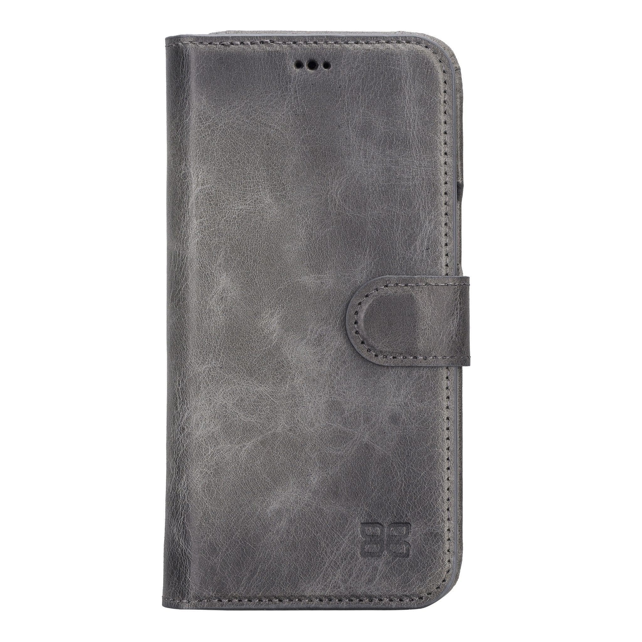 Apple iPhone 14 Series Full Leather Coating Detachable Wallet Case in black leather, showcasing its sleek design and card slots.