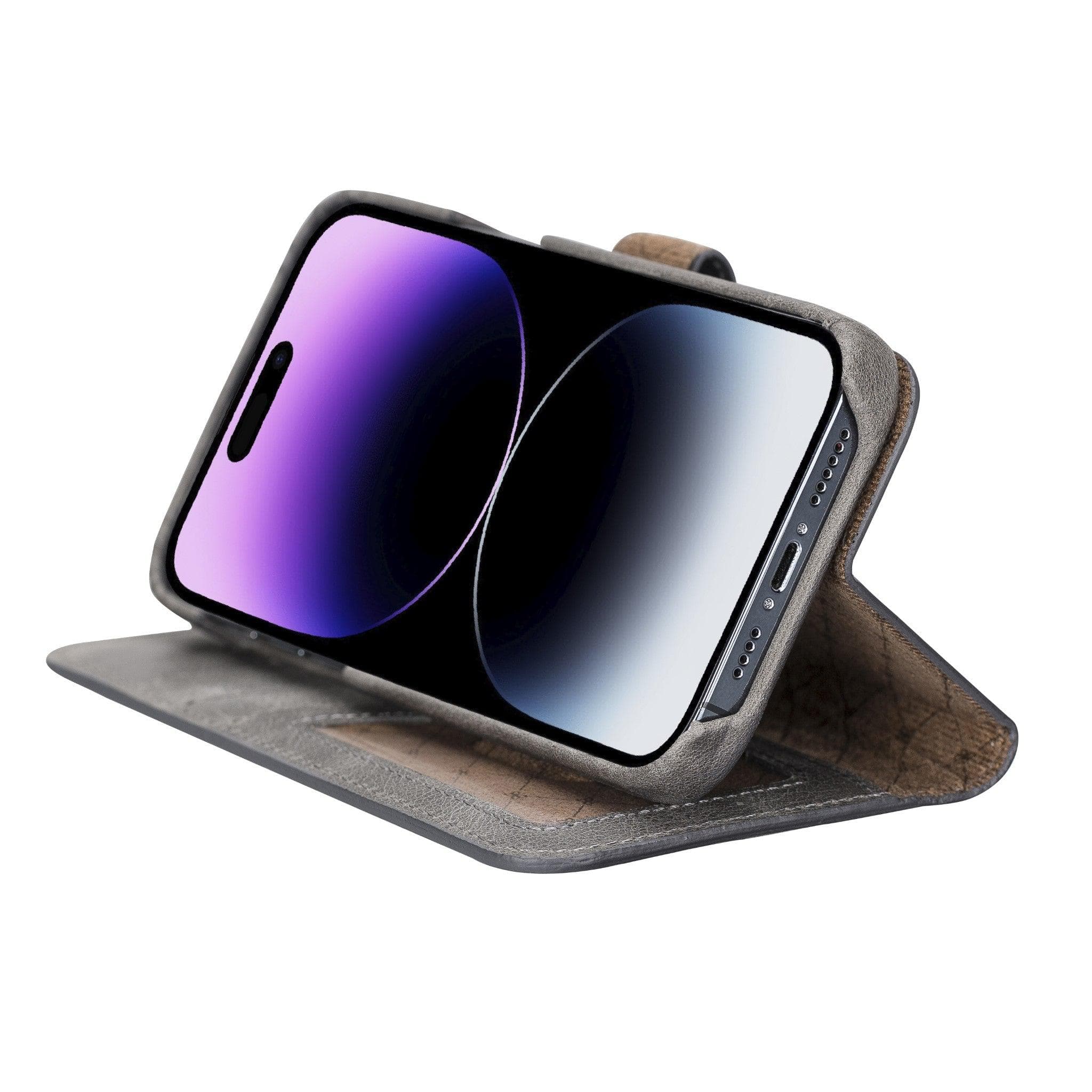 Apple iPhone 14 Series Full Leather Coating Detachable Wallet Case in black leather, showcasing its sleek design and card slots.