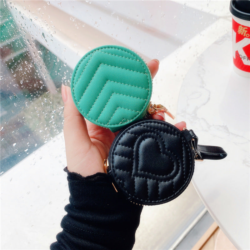 Stylish Bluetooth headset protective case made of imitation leather, featuring a zipper closure and available in multiple colors.