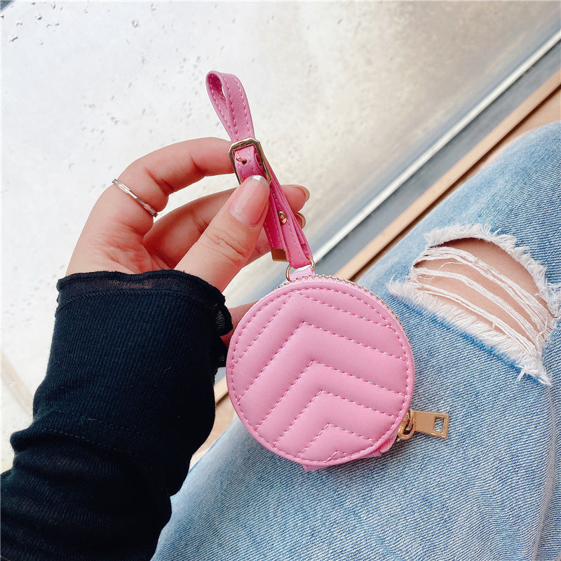 Stylish Bluetooth headset protective case made of imitation leather, featuring a zipper closure and available in multiple colors.