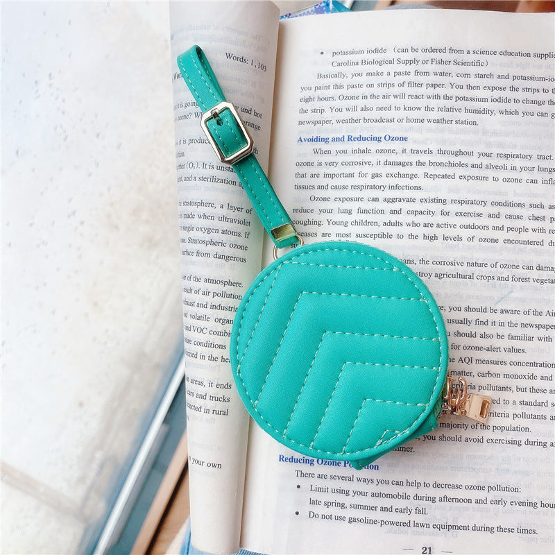 Stylish Bluetooth headset protective case made of imitation leather, featuring a zipper closure and available in multiple colors.