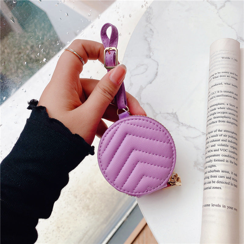 Stylish Bluetooth headset protective case made of imitation leather, featuring a zipper closure and available in multiple colors.