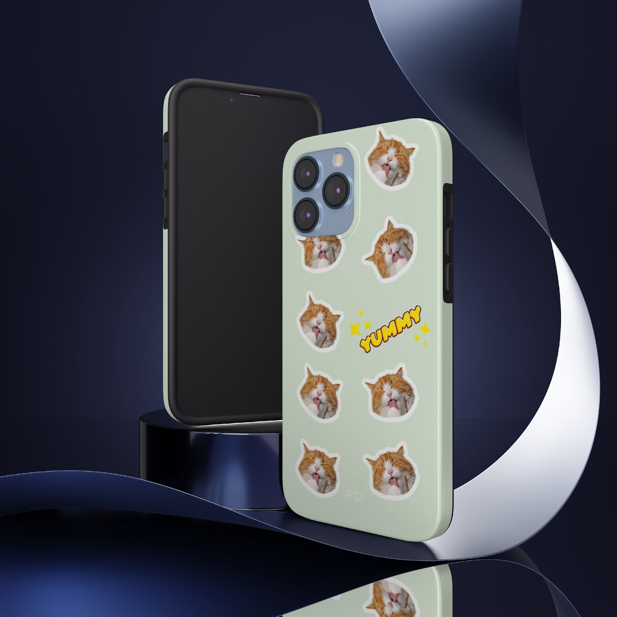 Cat Yummy Tough Case for iPhone, featuring a glossy finish and rubber lining for protection, designed for wireless charging.