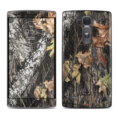 Camouflage-patterned smartphone with leaves.