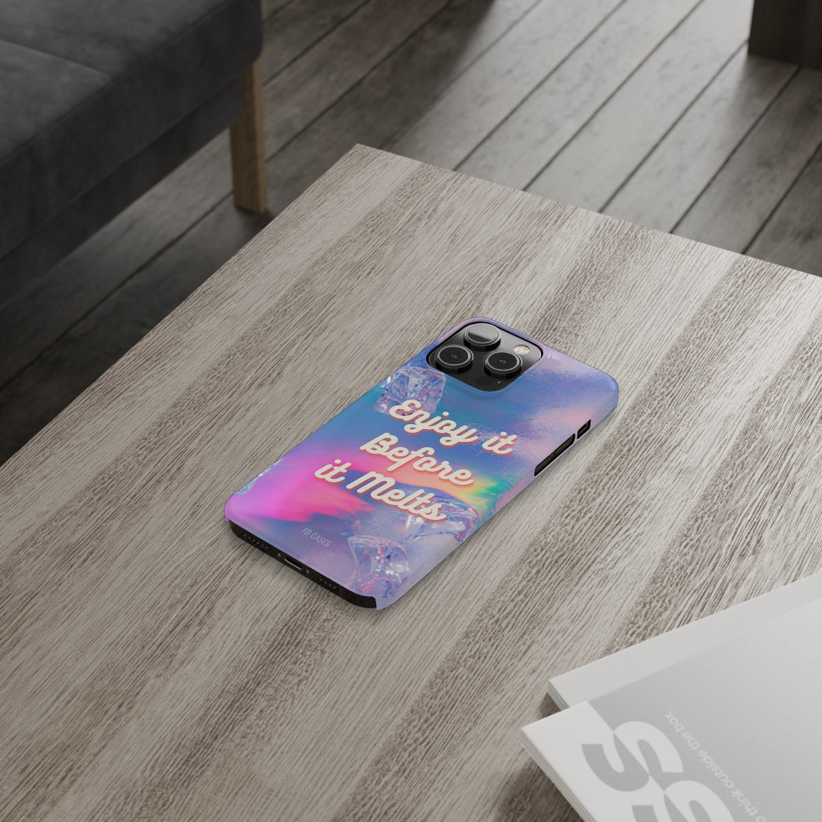 Enjoy It Before It Melts Slim Case for iPhone 14, showcasing a glossy finish and super slim design.