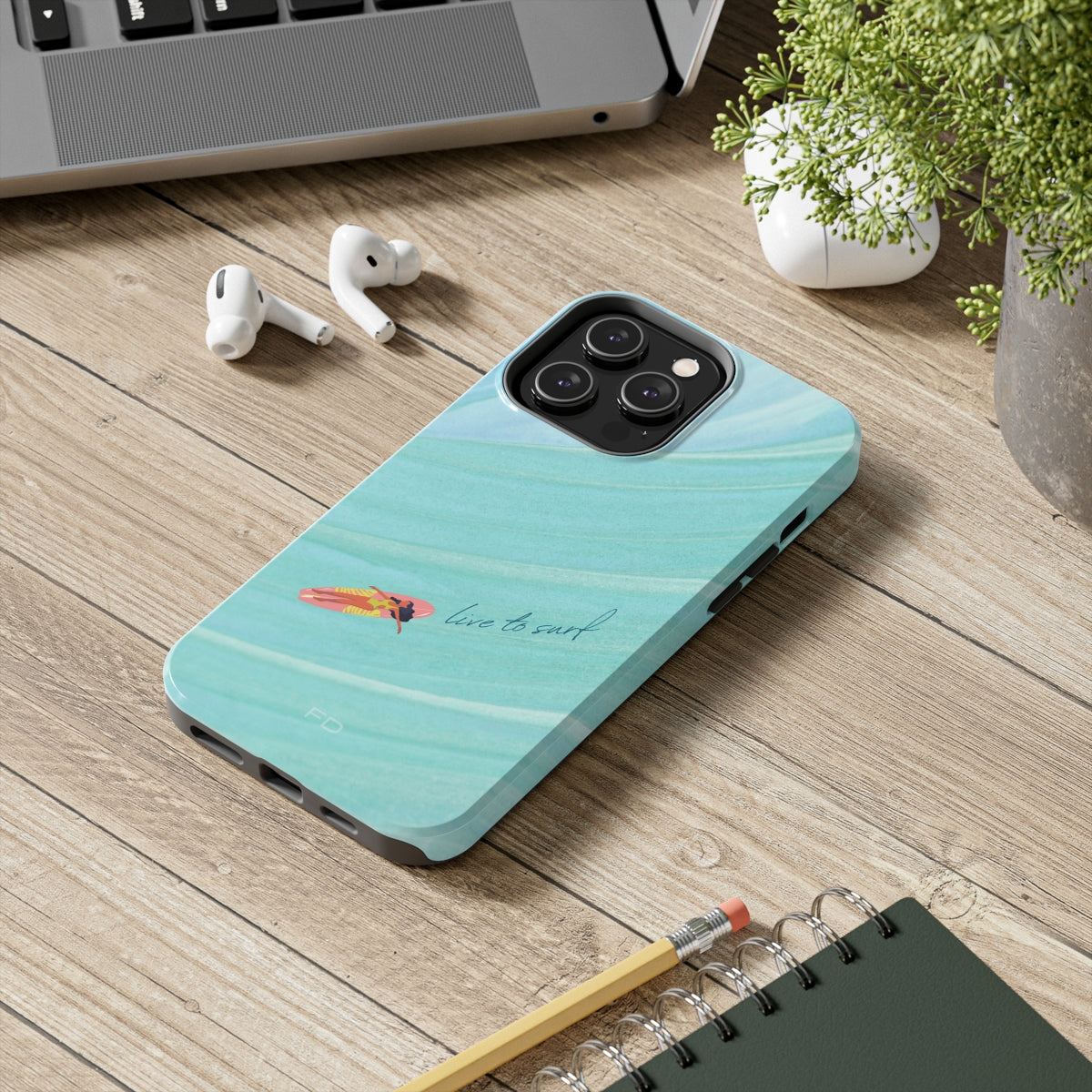 Live to Surf Tough Case for iPhone, featuring a glossy finish and rubber liner for protection, designed for wireless charging.