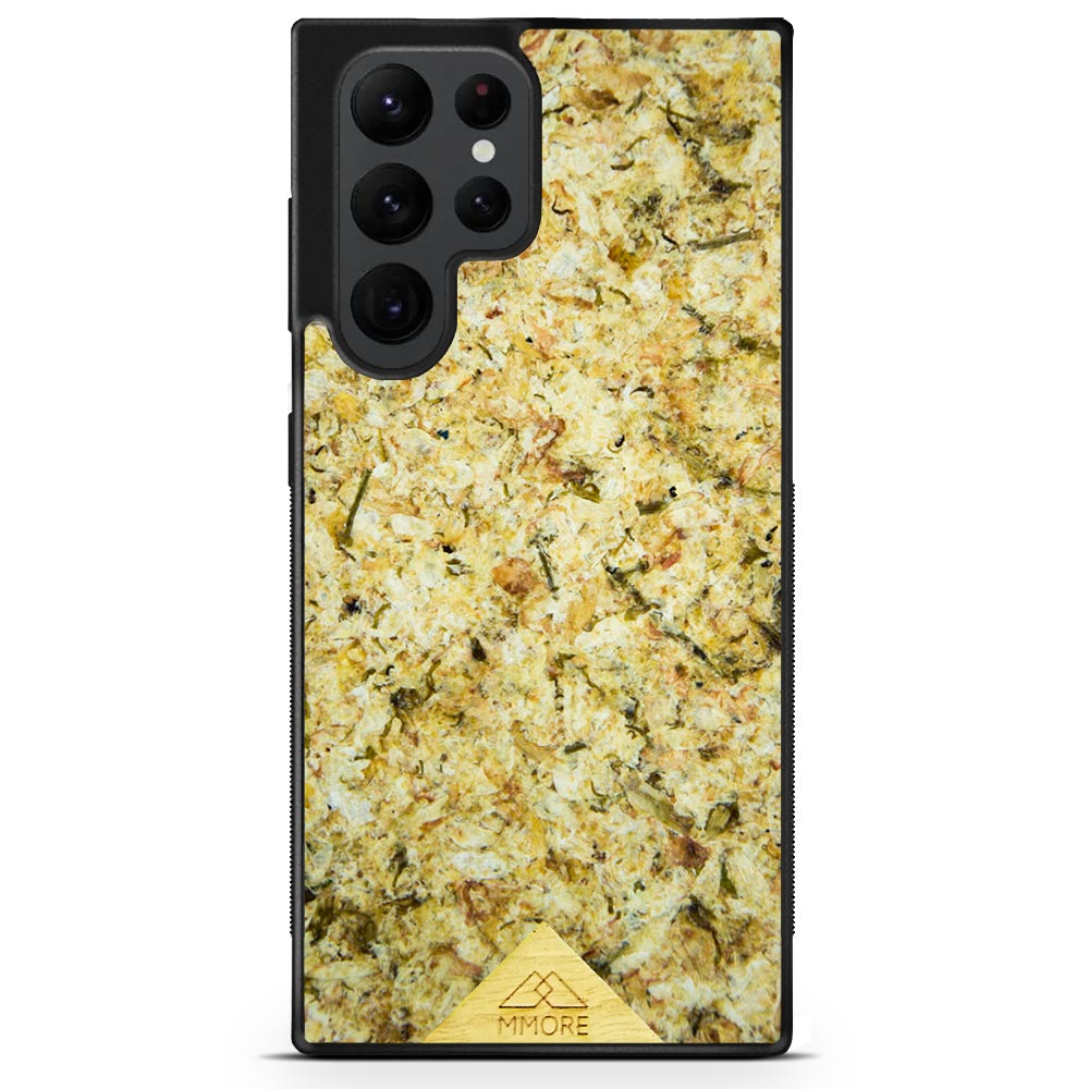 Organic Jasmine Phone Case held by a woman, showcasing its unique design and natural materials.