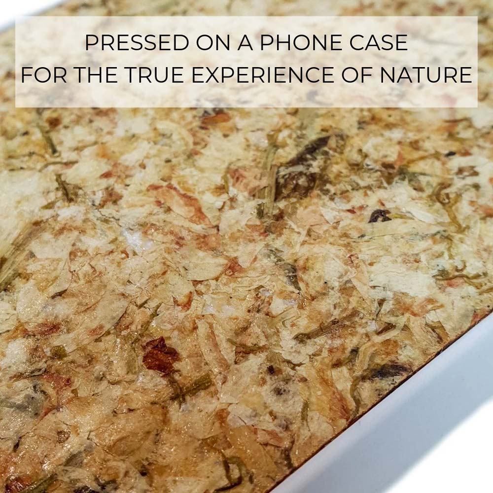 Organic Jasmine Phone Case held by a woman, showcasing its unique design and natural materials.