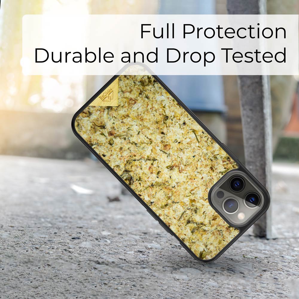 Organic Jasmine Phone Case held by a woman, showcasing its unique design and natural materials.