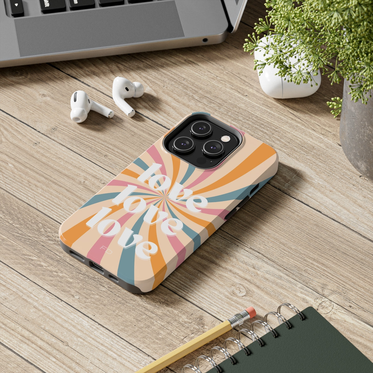 Retro Love Touch Case for iPhone featuring a glossy finish, impact-resistant design, and wireless charging support.