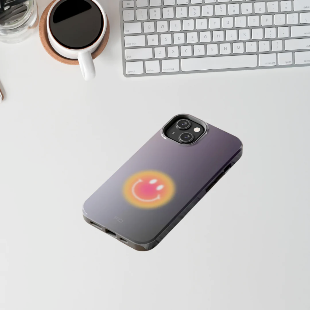Smiley Face Tough Case for iPhone, showcasing a cheerful design with impact-resistant features and wireless charging support.
