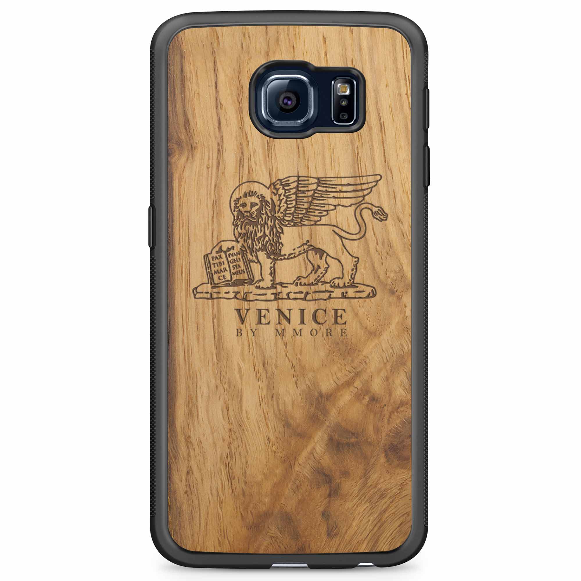 Handcrafted Venice phone case featuring the Lion of St. Marco, made from ancient oak wood, showcasing its unique grain and engraving.
