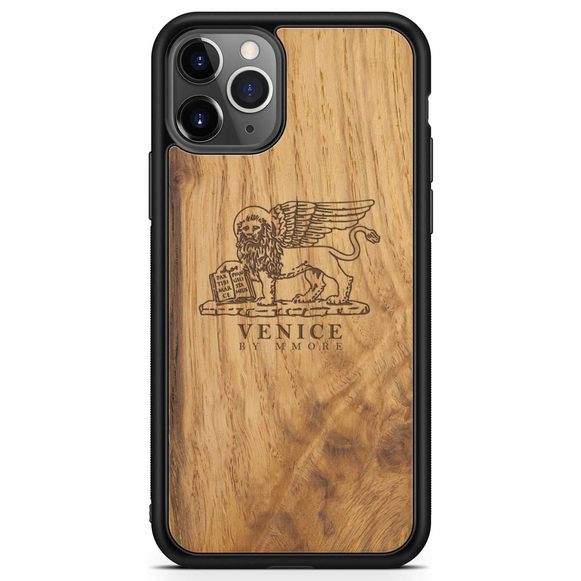 Handcrafted Venice phone case featuring the Lion of St. Marco, made from ancient oak wood, showcasing its unique grain and engraving.