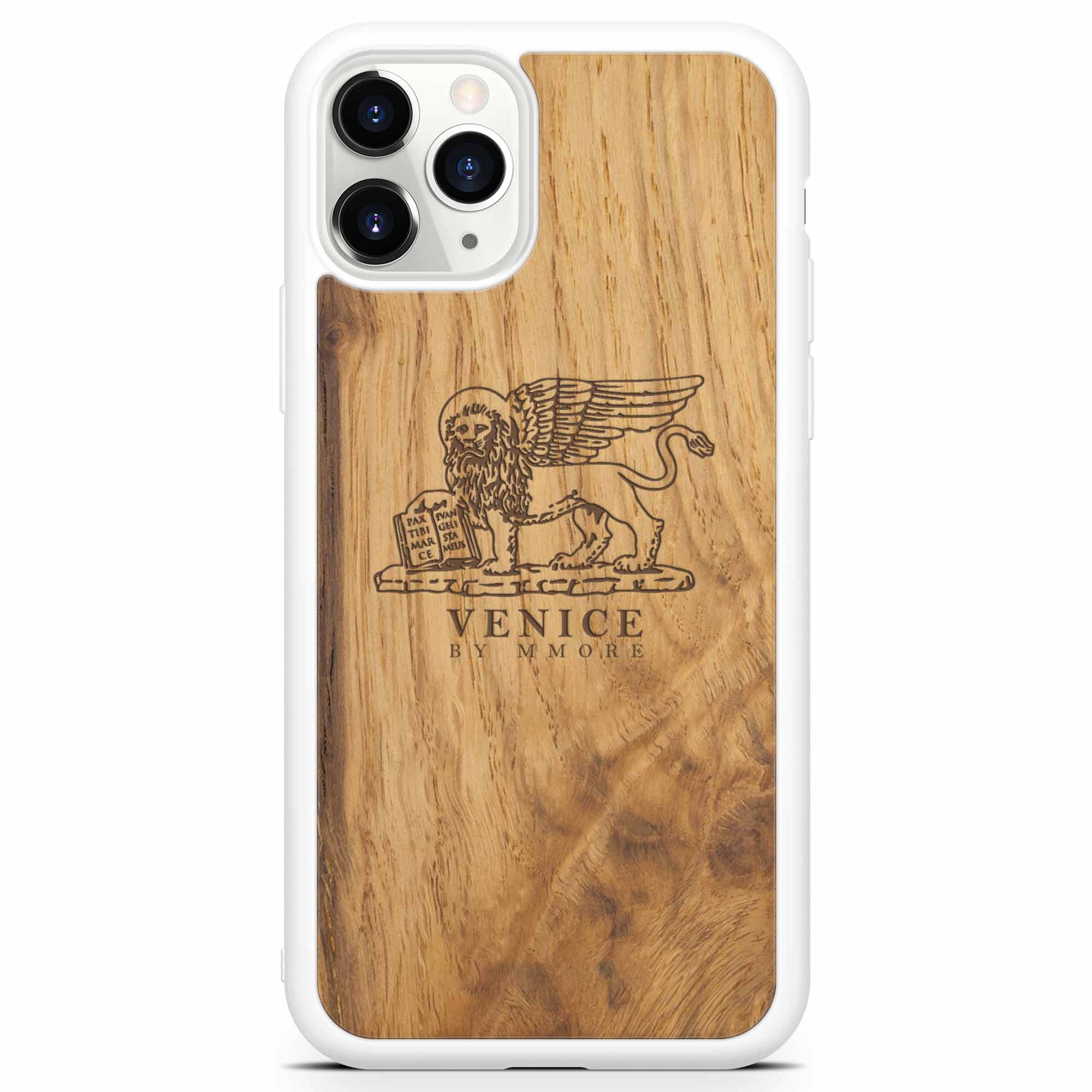 Handcrafted Venice phone case featuring the Lion of St. Marco, made from ancient oak wood, showcasing its unique grain and engraving.