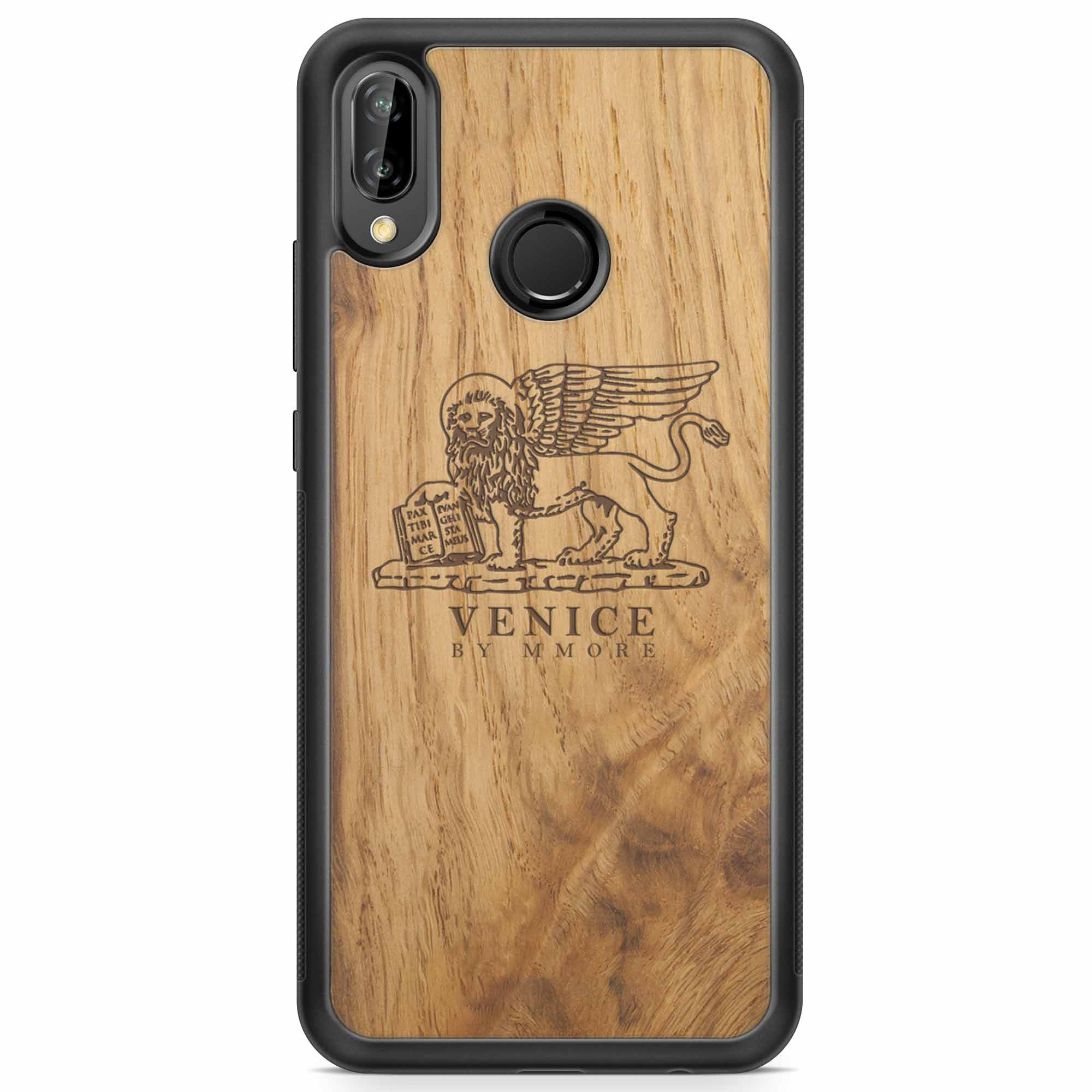Handcrafted Venice phone case featuring the Lion of St. Marco, made from ancient oak wood, showcasing its unique grain and engraving.