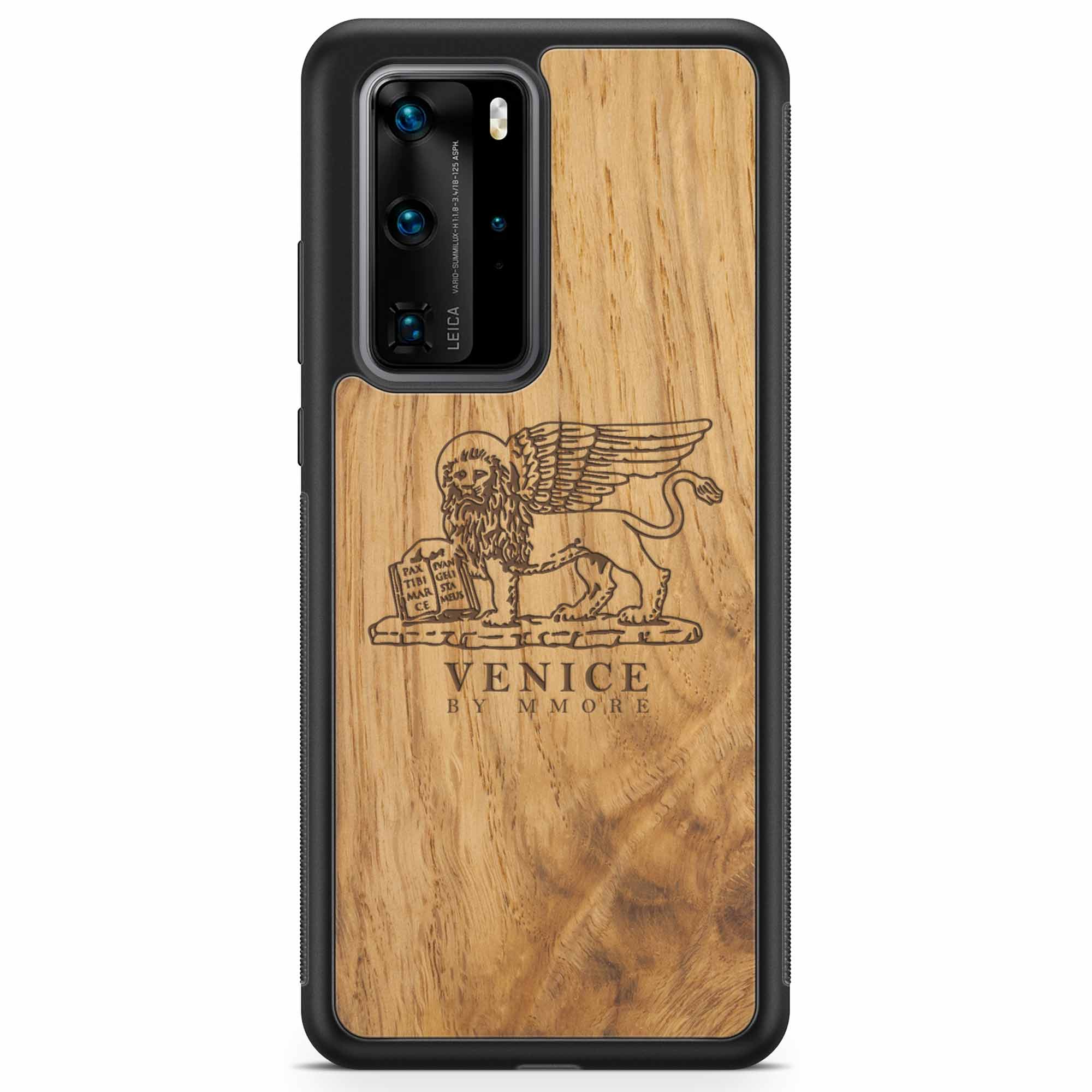Handcrafted Venice phone case featuring the Lion of St. Marco, made from ancient oak wood, showcasing its unique grain and engraving.