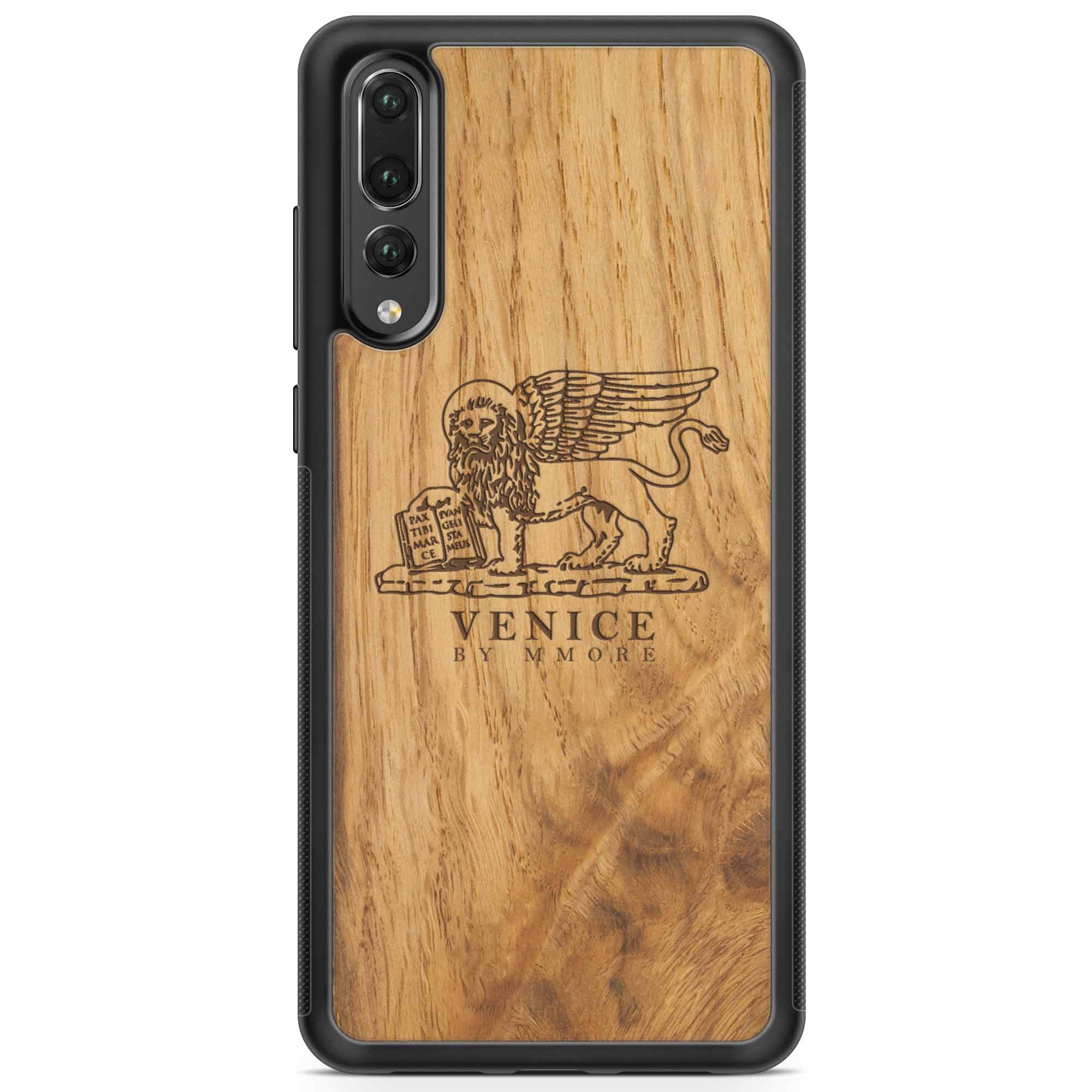 Handcrafted Venice phone case featuring the Lion of St. Marco, made from ancient oak wood, showcasing its unique grain and engraving.