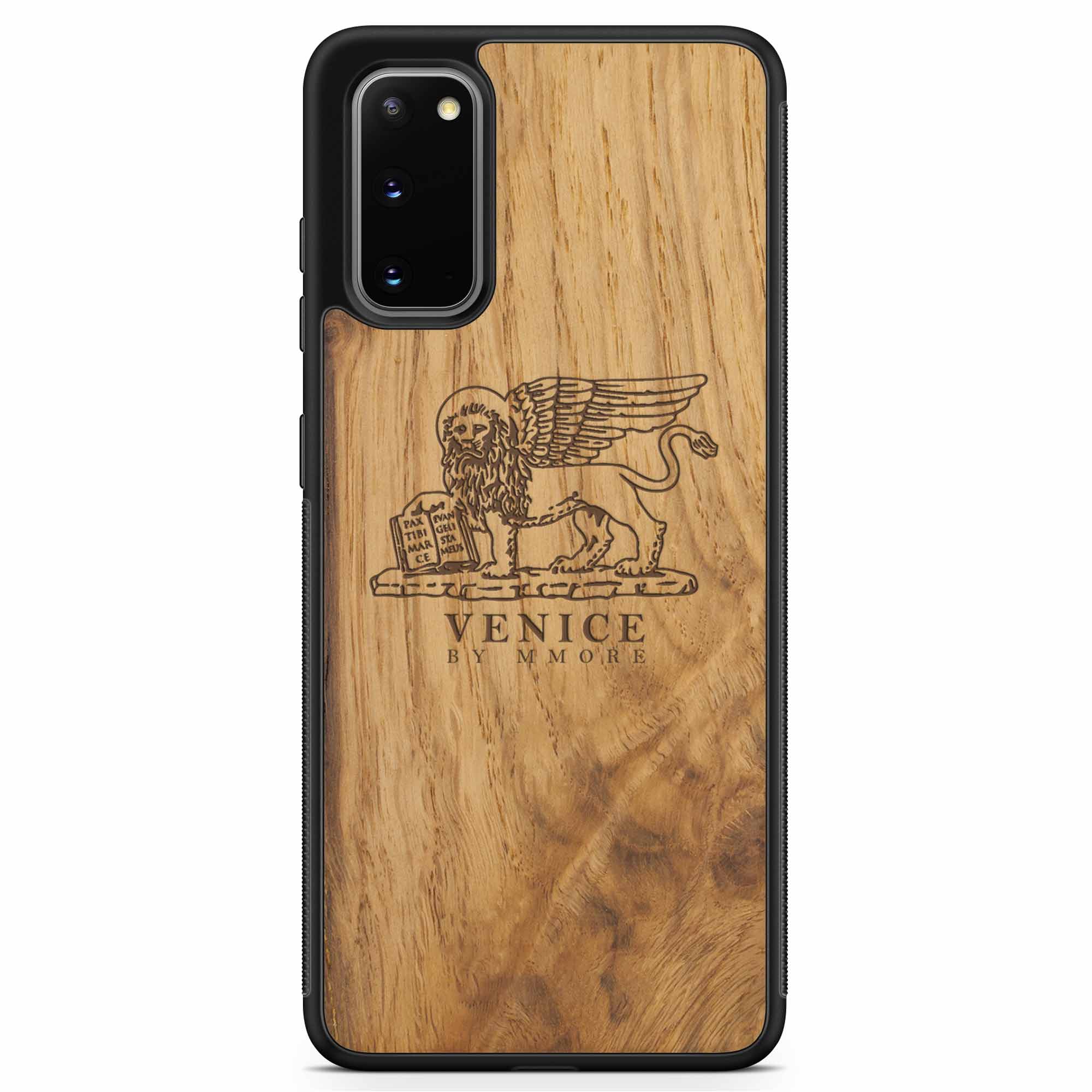 Handcrafted Venice phone case featuring the Lion of St. Marco, made from ancient oak wood, showcasing its unique grain and engraving.