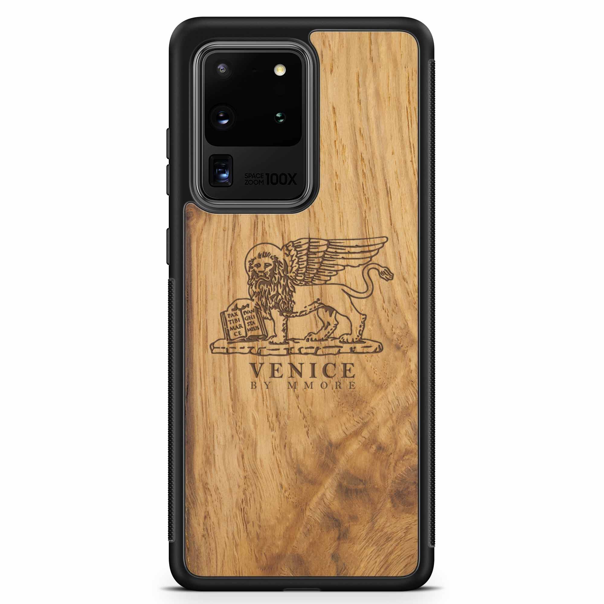 Handcrafted Venice phone case featuring the Lion of St. Marco, made from ancient oak wood, showcasing its unique grain and engraving.