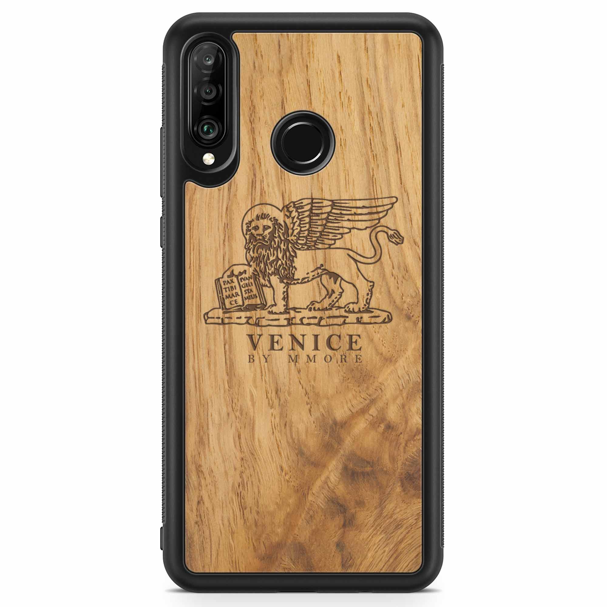 Handcrafted Venice phone case featuring the Lion of St. Marco, made from ancient oak wood, showcasing its unique grain and engraving.