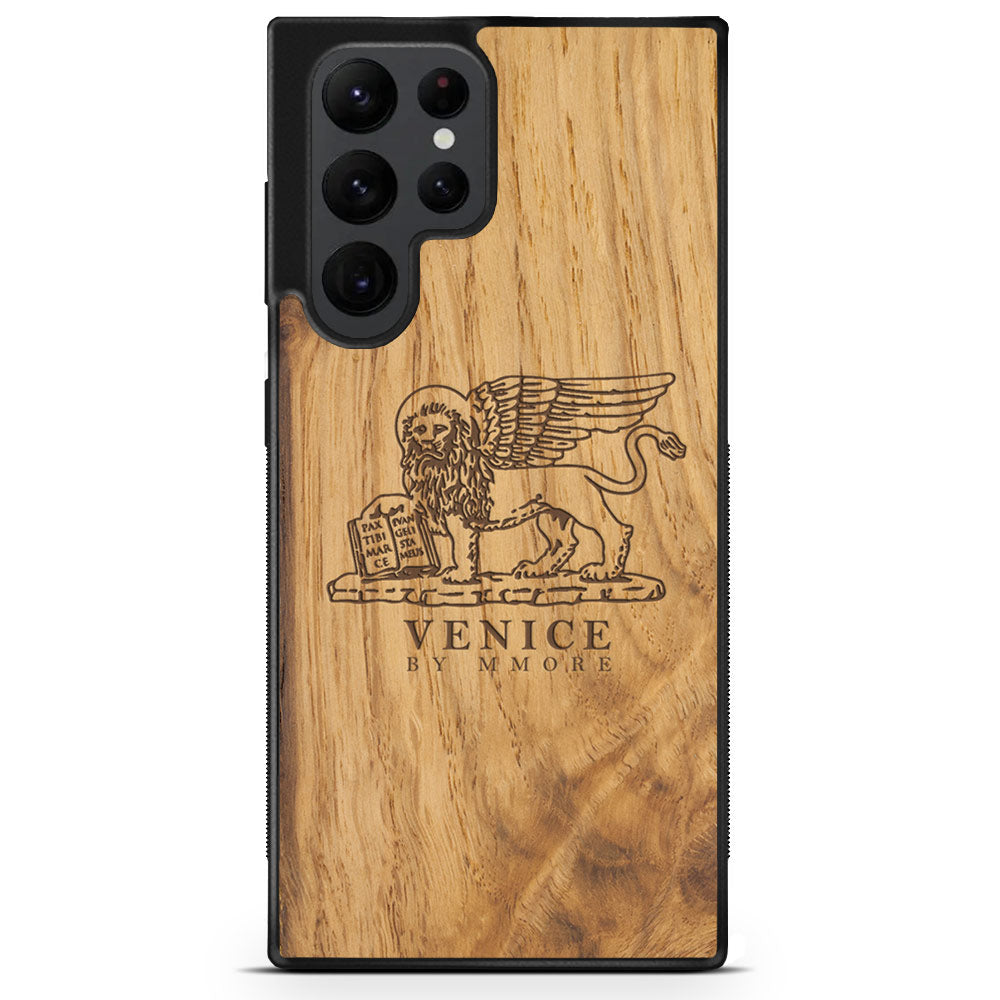 Handcrafted Venice phone case featuring the Lion of St. Marco, made from ancient oak wood, showcasing its unique grain and engraving.