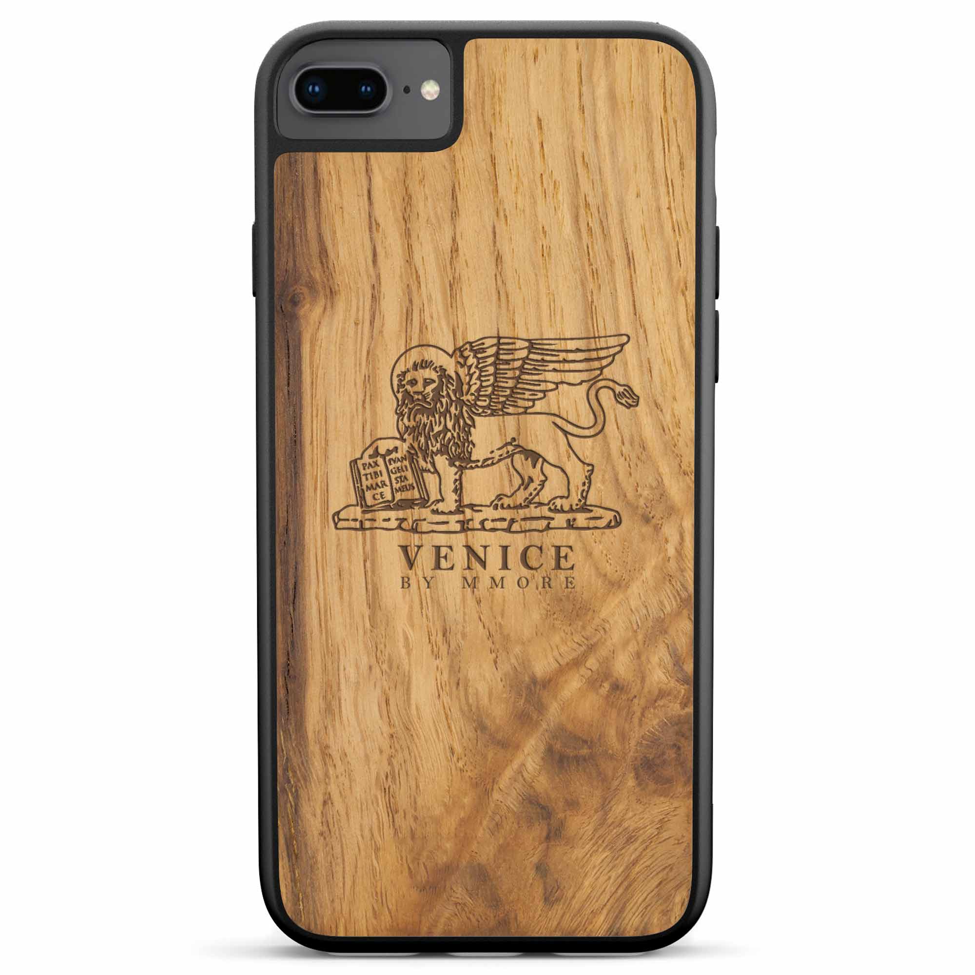 Handcrafted Venice phone case featuring the Lion of St. Marco, made from ancient oak wood, showcasing its unique grain and engraving.