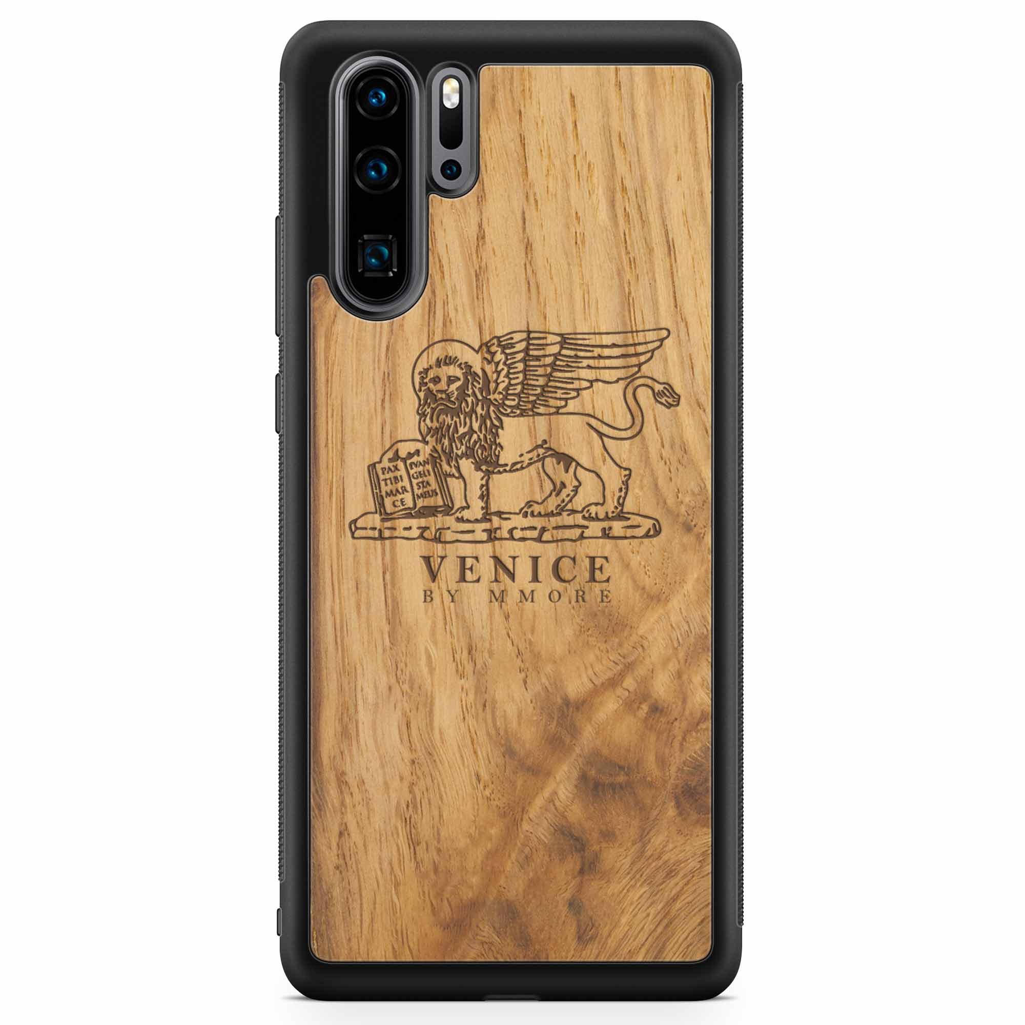 Handcrafted Venice phone case featuring the Lion of St. Marco, made from ancient oak wood, showcasing its unique grain and engraving.