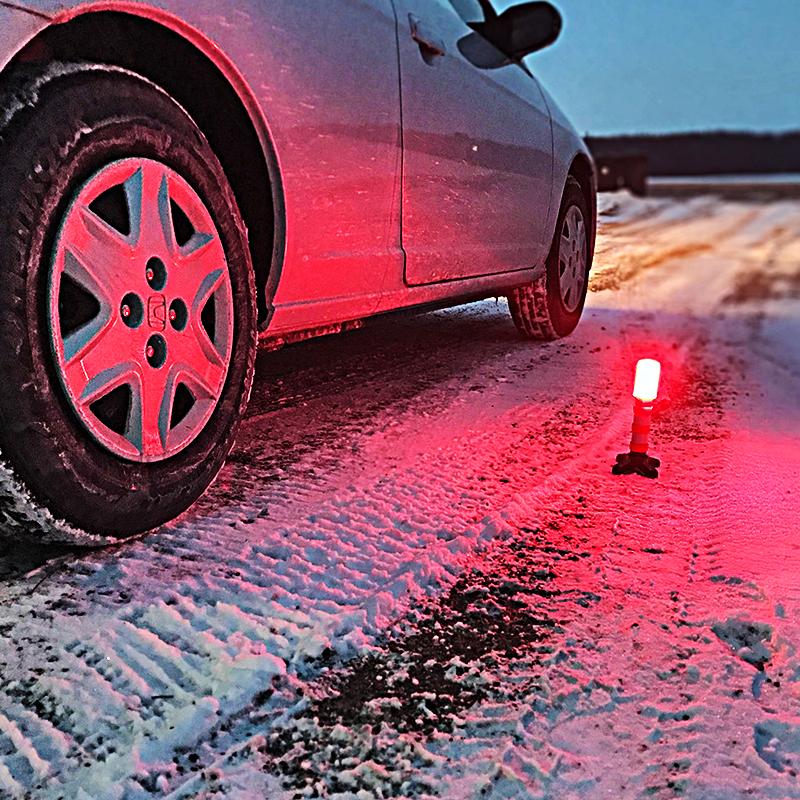 3-in-1 LED Roadside Flare kit with two flares and carrying case, showcasing their bright colors and magnetic bases.