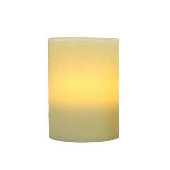 Flameless 4 x 5 Flat Top Wax Pillar Candle in a cozy setting, showcasing its realistic wax finish and warm glow.