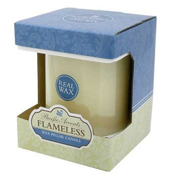 Flameless 4 x 5 Flat Top Wax Pillar Candle in a cozy setting, showcasing its realistic wax finish and warm glow.