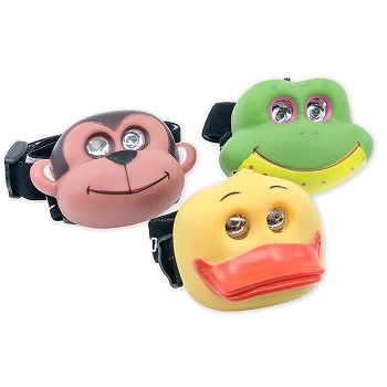 Luminal LED Headlamps featuring monkey, duck, and frog designs with illuminated eyes.