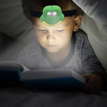 Luminal LED Headlamps featuring monkey, duck, and frog designs with illuminated eyes.