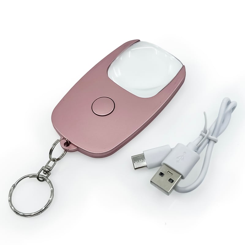 Pocket Zoom™ Recharge mini magnifier with LED light, compact design in gold, silver, and rose gold colors.