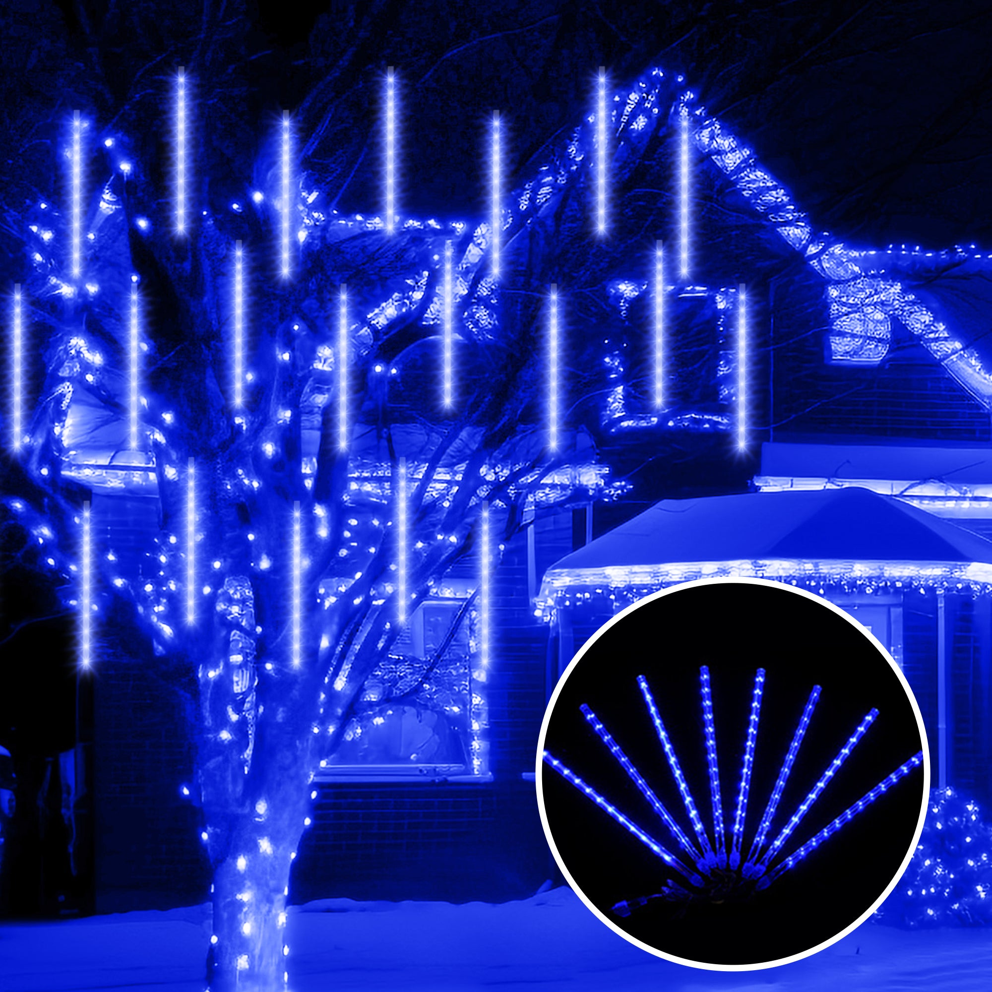 Pulg in Fairly String Lights LED Icicle Lights hanging outdoors, creating a stunning meteor shower effect with vibrant colors.