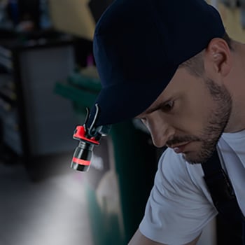 Radius™ Zoom Clip-On COB LED Cap Light displayed on a cap, showcasing its compact design and illumination features.