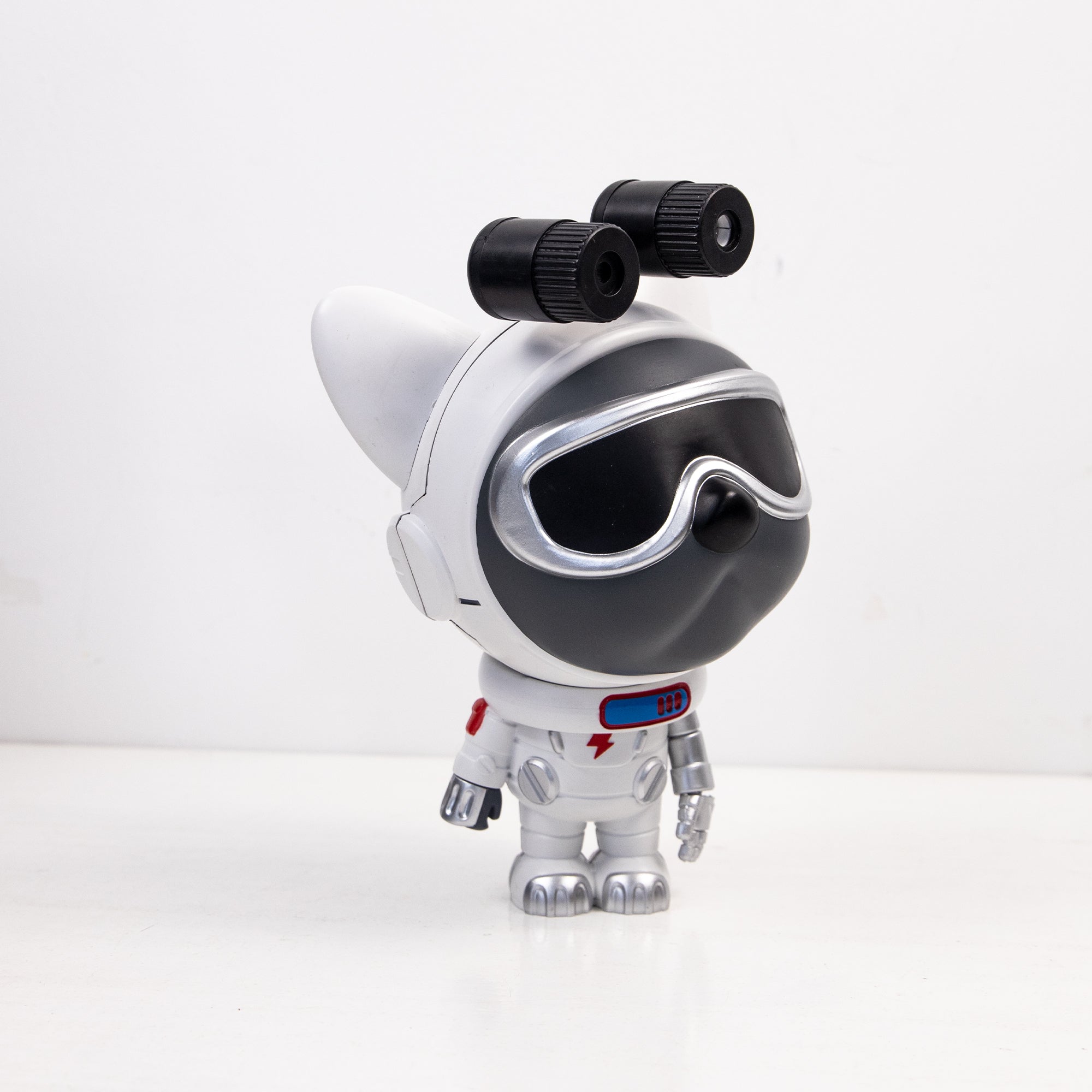Star Projector Lamp featuring a cute dog astronaut design, projecting colorful nebula patterns onto the ceiling.